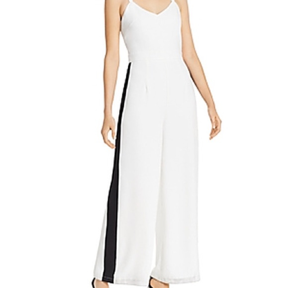Bloomingdale’s Jumpsuit with Black Side Stripes, low back. Size small